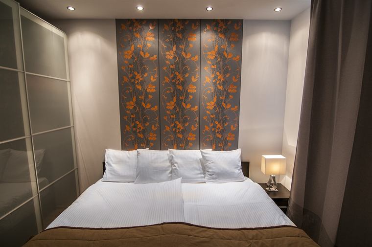 A bedroom arranged for rest